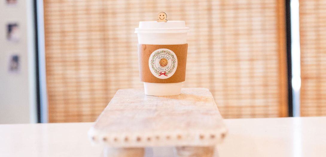 festive Sundial coffee cup with sticker